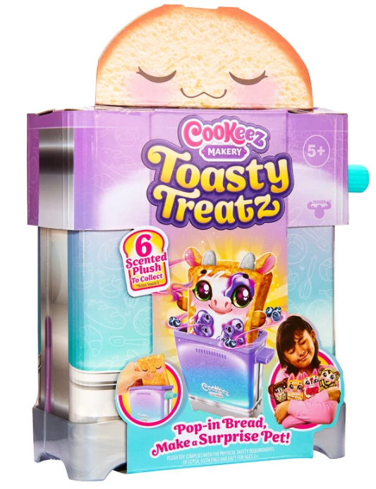 Cookzeez Makery Toasty Treatz toy set in its retail packaging, featuring a pop-in bread character and a surprise pet plush inside a purple and silver box with colorful graphics.
