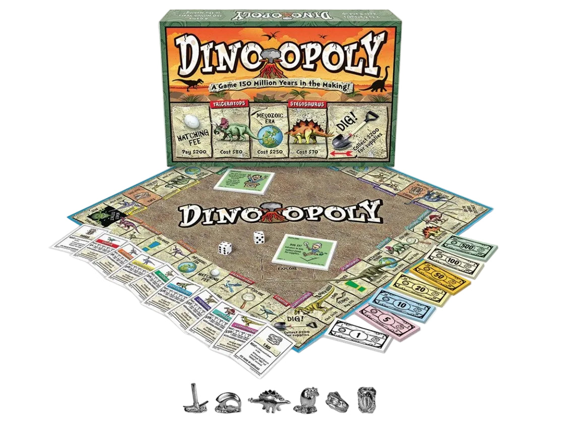 Dinoopoly board game set with the game box, play mat, property cards, and metal game pieces arranged on a white background.