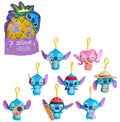 1 randomly selected Stitch-themed plush keychain figures in various outfits, displayed alongside their colorful pineapple-shaped retail packaging on a plain white background.