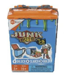 Junk Bot 13 toy building set in its original retail packaging, featuring a blue box with orange lids and green slime graphics, containing 13 small toy figures.