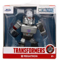 Transformers Megatron die-cast action figure in its original window box packaging, featuring a silver and gray robot with red accents and a purple 'W' emblem on the chest.