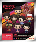 Funko Pop! Stranger Things Figural Bag Clip figure set in its original packaging, featuring multiple chibi-style characters and a large red flower graphic on a black, orange, and purple background.