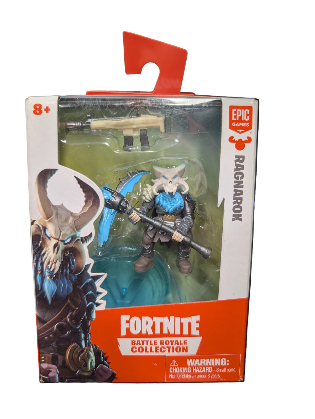 Fortnite Battle Royale Collection Ragnarok action figure in its original packaging, featuring a white and gray wolf character with a blue shield, held by an Epic Games brand card.