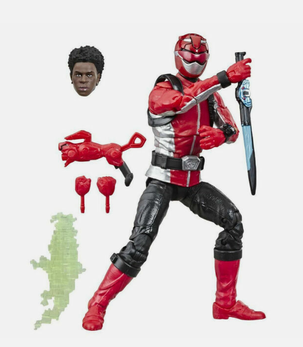 A red and black action figure with an interchangeable head, extra hands, and a sword accessory, shown on a plain light gray background.