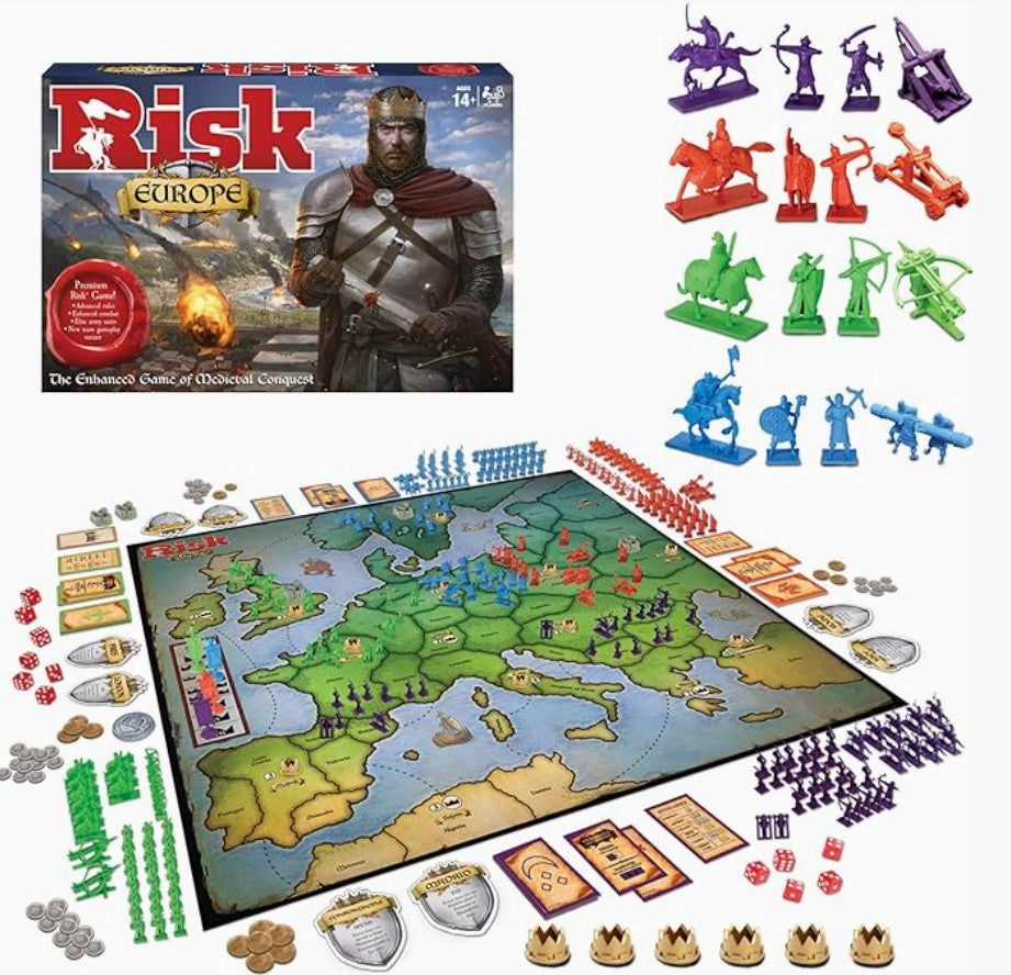 Risk Europe board game set displayed on a white background, showing the game box, the assembled map with player territories, various colored military and resource tokens, dice, and cards. The box features a medieval knight, and the right side shows individual colored unit sets.