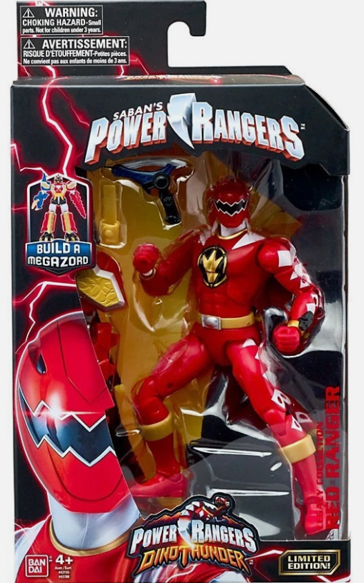 Saban's Power Rangers Dino Thunder Red Ranger Dinotruck Limited Edition action figure in its original window box packaging, featuring a red and gold figure with a Megazord accessory.