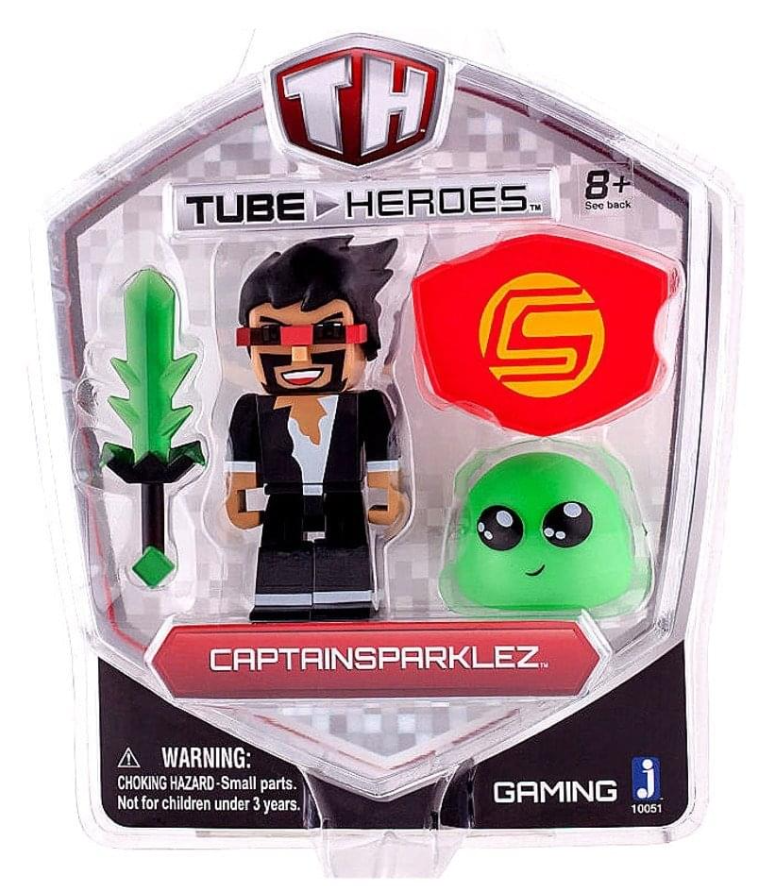 Captain Sparklez toy figure in its original retail blister packaging, featuring a black and white minifigure with a green sword, a red shield, and a green slime accessory.