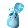 A light blue plush bear-shaped squishy toy with a matching blue keychain clip and a teal hanging tag featuring the Xwax logo and character art, shown on a plain white background.