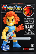 ThunderCats Classic action vinyl figure in retail packaging, featuring Lion-O with orange hair, a blue vest, and a silver sword, alongside product text and the ThunderCats logo.