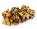 A set of translucent amber-brown polyhedral gaming dice with black printed numbers, arranged on a plain white background.