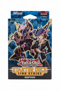 A Yu-Gi-Oh! Trading Card Game Starter Deck Link Strike card pack by Konami, featuring artwork of Yugi and a dark monster on a blue patterned background, photographed on a textured teal surface.